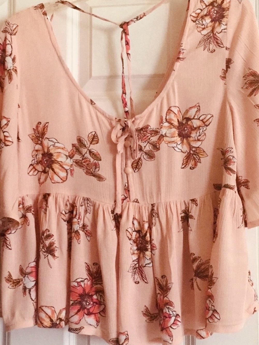 Tie-Front Floral Peplum Tunic in Blush Pink